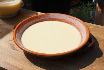 Preparation of rice cake, a typical dessert from northern Tuscany