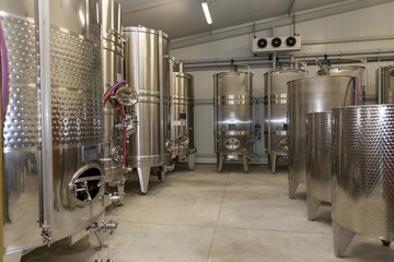 Naklejka na ściany i meble A food tank is a container for the production and storage of wine