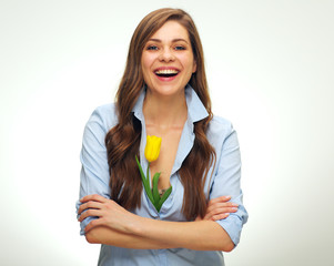Smiling woman holding one tulip isolated portrait