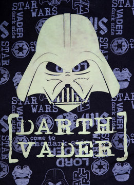 Moscow,  Russia - April, 2020 Fragment of a brand Star wars t-shirt with a signature pattern, Darth Vader