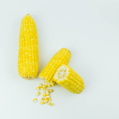 Yellow raw corn on white background