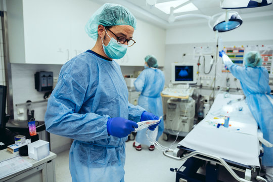 Doctors preparing trauma room of a hospital