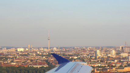 BERLIN, GERMANY - JUL 06th, 2015: Aerial view of Berlin capital of Germany - wing view from the airplane