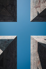 Cross formed in the sky, out of architectural elements