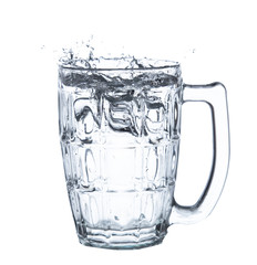 pouring water on a glass on white background clipping path