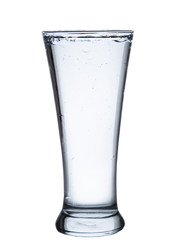 pouring water on a glass on white background clipping path