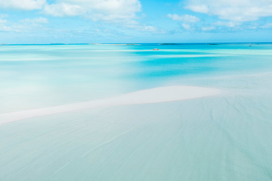 Long white sand bank on Coco Plum Beach, Exuma, Bahamas, Caribbean