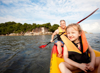 Father and daughter canoeing together, Koh Samui, Thailand