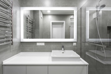 bathroom interior with sink tap and mirror