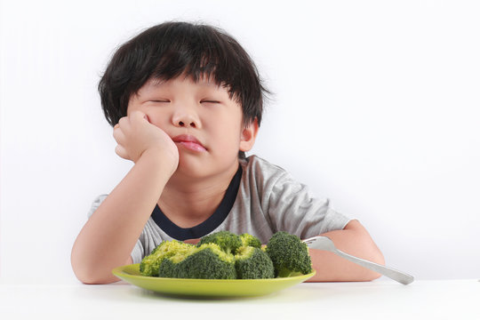 Little Asian Boy Refuses To Eat Healthy Vegetables.