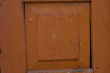 Fototapeta na wymiar Piece of an old wooden door