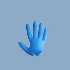 A blue medical glove on the plain background