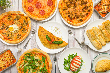 Image of pizzas from an elevated point of view
