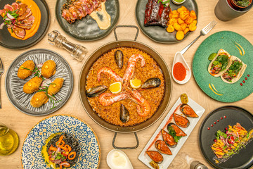overhead photo of varied typical Spanish food