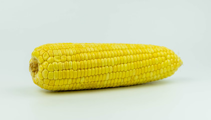 Yellow raw corn on white background