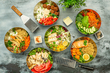 metallic bowls with healthy food gray table top