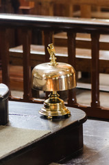 Fototapeta na wymiar Brass mass bell in a Catholic church