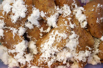 Brown Sugar Apem Cake with grated coconut.    