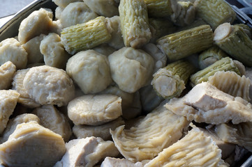 Siomay (also Somay), is an Indonesian steamed fish dumpling with vegetables served in peanut sauce.  