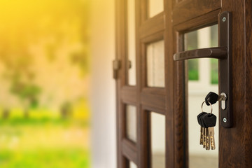 Strong lock with keys in the front door. door lock with keychain, open door