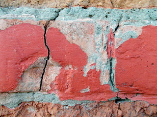 
Crack in the wall of the building. Blurred defocused background for web design.