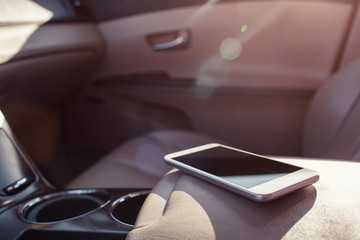 smart phone phone on the car seat dashboard