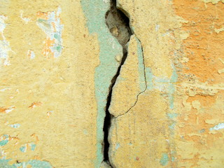 
Crack in the wall of the building. Blurred defocused background for web design.