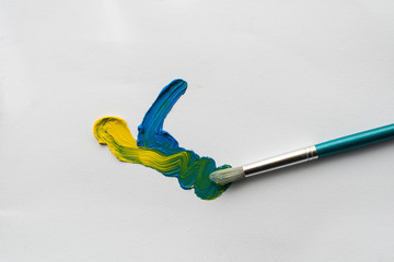 Paintbrush and oil paints