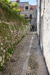 Narrow street on stone slope in Dubrovnik, Croatia, Europe.