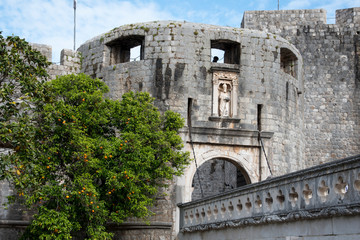 Fototapeta premium Pile Gate, entrance through the stone wall, to the old town of Dubrovnik, Croatia, Europe
