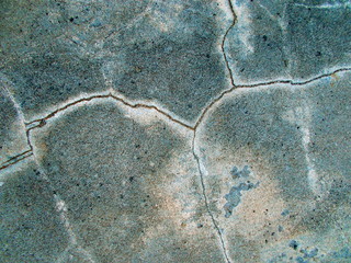 
Crack in the wall of the building. Blurred defocused background for web design.