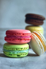 colorful macaroons on a light background dessert
