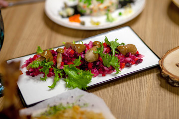 vinaigrette with pickled mushrooms in a plate on the table