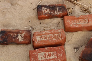 Old bricks on the beach