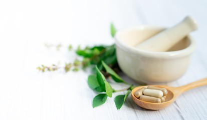 Alternative medicine herbal organic capsule, mineral, drug with herbs leaf natural supplements for healthy good life.
