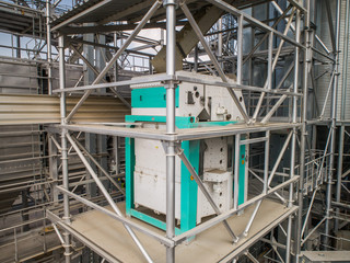 Metal structures of grain dryer and separator at the grain terminal.