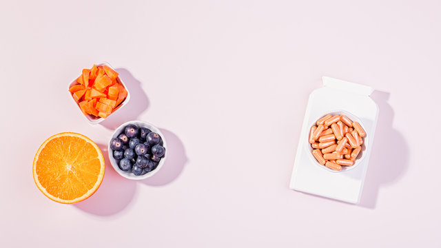 Vitamins And Supplements For Healthy Eyes And Foods Containing Vitamins For Good Eyesight On Pink Table Top. How To Maintain Good Vision Concept, Flat Lay, Top View