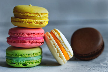 colorful macaroons on a light background dessert