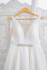 wedding dress on hangers