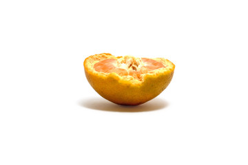 A ripped sweet orange (Citrus sinensis) isolated on white background, perfect for breakfasting during ramadan