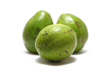 Three avocados (Persea americana) isolated on white background, perfect for breakfasting during ramadan