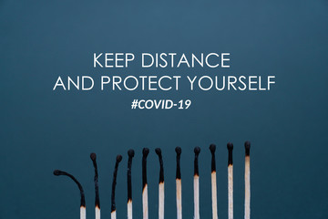 Maintain a distance between you and other people. Social distancing concept using burnt out match sticks as a metaphor for containing coronavirus or any virus or pandemic outbreak. Stay at home