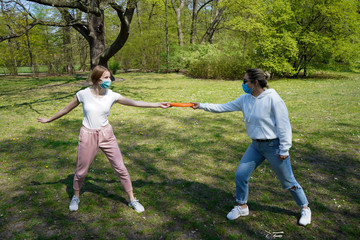 coronavirus, park, health, mask, protective mask, frisbee, fun, background, throw, girl, active, recreation, nature, green, leisure, grass, summer, happy, caucasian, activity, game, play, people, spor