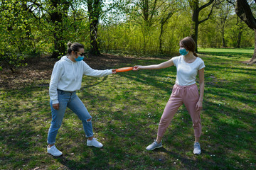 coronavirus, park, health, mask, protective mask, frisbee, fun, background, throw, girl, active,...