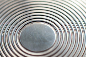 Fototapeta na wymiar Round blurred metal texture. Metal circles. Macro photo