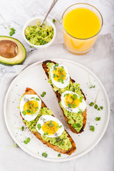 Avocado Sandwich with Egg and Micro green. Healthy breakfast concept
