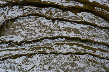 water flowing on rocks