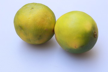 Yellow and green color whole ripe Sweet lime fruits or Citrus limetta
