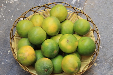 Yellow and green color whole ripe Sweet lime fruits or Citrus limetta