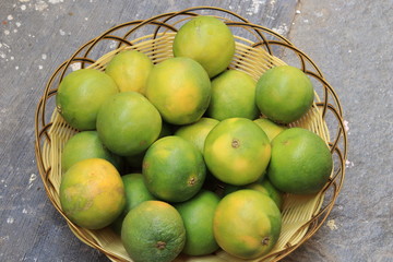 Yellow and green color whole ripe Sweet lime fruits or Citrus limetta